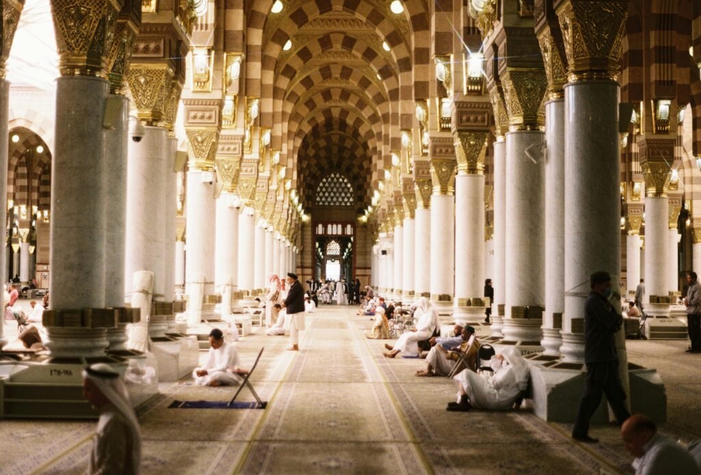 Beautiful view capturing the ornate interior of Al-Masjid an-Nabawi in Madinah, Saudi Arabia.